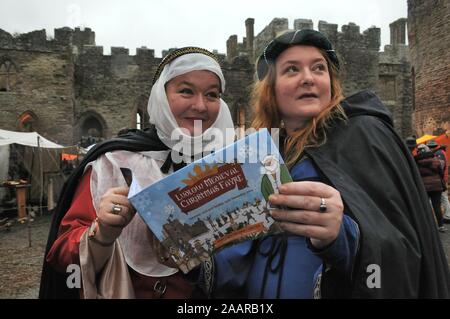 Ludlow, Shropshire, UK, 23rd November 2019. Ludlow Medieval Christmas Fayre. Worcester sisters Mary and Sally Brewer who dressed up for fun at the event. Stock Photo