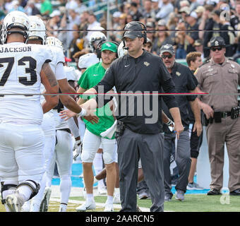 New Orleans, LA, USA. 23rd Nov, 2019. UCF head coach Josh Heupel congratulates his team after scoring a touchdown during the NCAA football game between the Tulane Green Wave and the UCF Knights at Yulman Stadium in New Orleans, LA. Kyle Okita/CSM/Alamy Live News