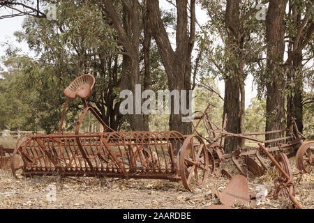 Very old rusted farming equipment like agricultural field cultivator from the turn of the century Stock Photo