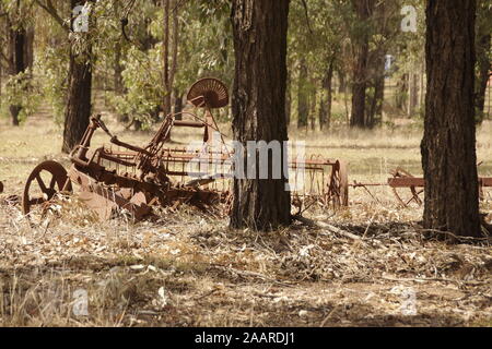 Very old rusted farming equipment like agricultural field cultivator from the turn of the century Stock Photo