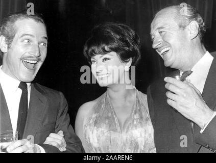 Nov. 24, 1964 - Boulogne-Billancourt, France - PAUL NEWMAN, left, Italian actress SOPHIA LOREN and DAVID NIVEN laugh during a cocktail party given before the shooting of 'Lady L' at Boulonge Studios.  (Credit Image: © Keystone Press Agency/Keystone USA via ZUMAPRESS.com) Stock Photo