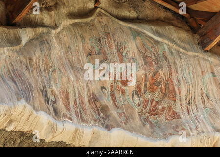 Remnants of painted frescoes-Mogao Buddhist caves exterior. Dunhuang-Gansu province-China-0626 Stock Photo