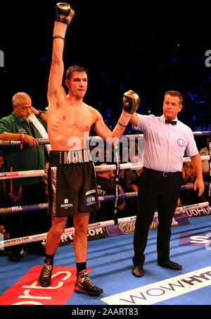 Callum Smith (left) celebrates victory over Norbert Nemesapati during ...