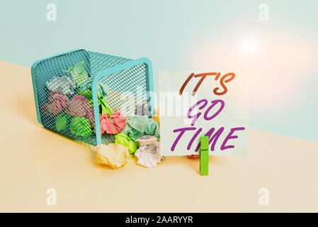 Handwriting text It S Go Time. Conceptual photo A period to undertake the assigned tasks Bring it ON Trash bin crumpled paper clothespin empty reminde Stock Photo