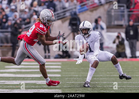 Columbus, Ohio, USA. 23rd Nov, 2019. Ohio State Buckeyes cornerback Shaun Wade (24) has a pass go through his hands and into the hands of Penn State Nittany Lions wide receiver KJ Hamler (1) in the second half of game between the Penn State Nittany Lions and the Ohio State Buckeyes at Ohio Stadium, Columbus, Ohio. Credit: Scott Stuart/ZUMA Wire/Alamy Live News Stock Photo