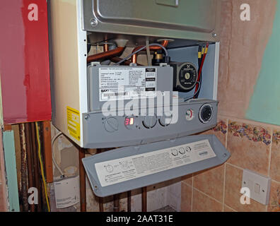 Gas Combi Boiler Central Heating being repaired, Worcester Bosch Stock Photo
