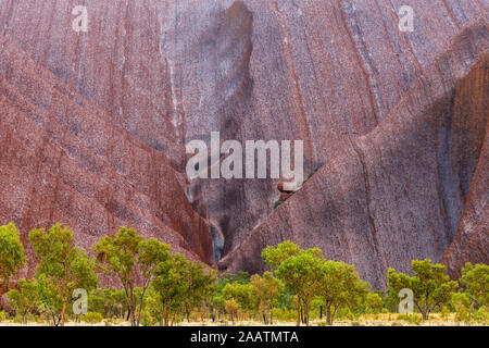 Uluru (Ayres Rock) in the rain after a long drought. Uluru, Northern Territory, Australia Stock Photo