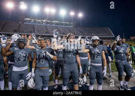 Houston, TX, USA. 23rd Nov, 2019. The Rice Owls celebrate a victory after an NCAA football game between the North Texas Mean Green and the Rice Owls at Rice Stadium in Houston, TX. Rice won the game 20 to 14.Trask Smith/CSM/Alamy Live News Stock Photo