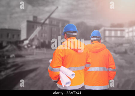 Two engineers looking at consrtuction site Stock Photo