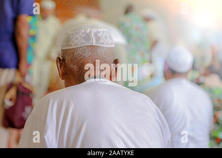 Old Muslim man praying Stock Photo