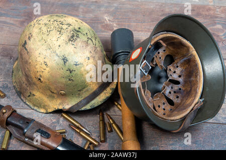 ww2 german army field equipment with two helmets and grenade Stock Photo
