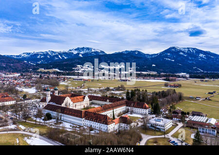 Aerial view over Benedictine monastery Benediktbeuren in winter, Bavaria, Germany Stock Photo
