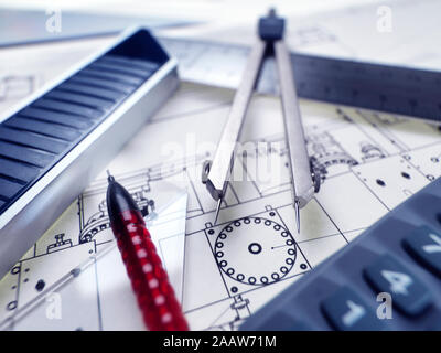 High angle close-up of drawing equipment on blueprint in office Stock Photo