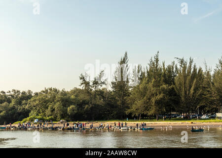 Fishing community and local community buying and selling fish near Yayasan Sabah bridge Kota Kinabalu Sabah Malaysia Borneo Stock Photo