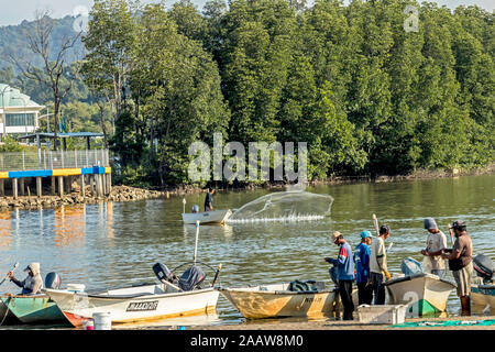 Fishing community and local community buying and selling fish near Yayasan Sabah bridge Kota Kinabalu Sabah Malaysia Borneo Stock Photo