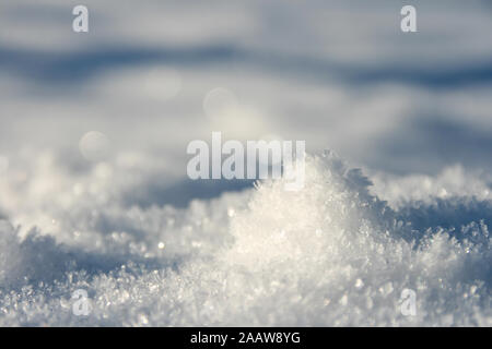 A pile of snowflakes. Nicely formed ice crystals probably due to mist and fog from surrounding rivers and lakes freezing because of the cold air tempe Stock Photo