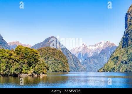 Scenic view of Doubtful Sound against mountains in Fiordland National Park at Te Anau, South Island, New Zealand
