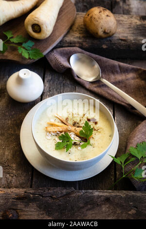 High angle view of oats soup with ingredients on wooden table Stock Photo