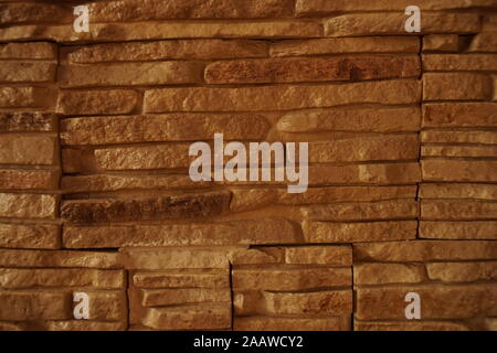 background masonry decorative stone for the fireplace. Stock Photo