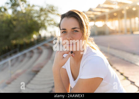Portrait of young woman outdoors Stock Photo