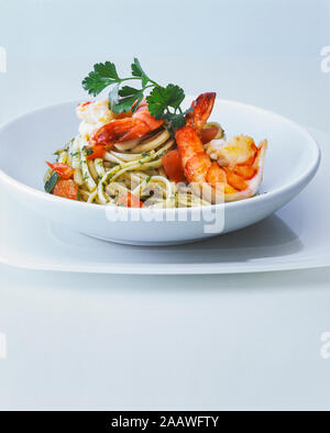 Close-up of spaghetti served in bowl on table Stock Photo