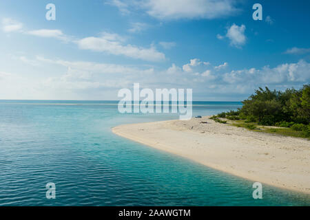 Idyllic lagoon of Ouvea, against sky in Loyalty Islands, New Caledonia Stock Photo