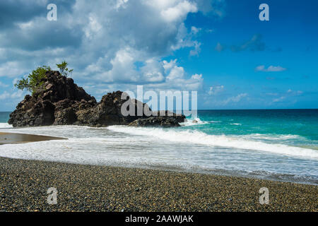 Scenic view of sea against sky at Tobago on sunny day, Caribbean Stock Photo