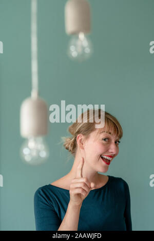 Portrait of excited woman Stock Photo