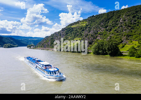 Aerial view of cruise ship on Rhine river by mountain at Boppard, Germany Stock Photo