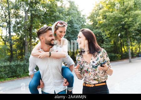 Group of three friends having fun together Stock Photo
