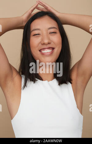Studio shot of beautiful young Chinese woman Stock Photo - Alamy