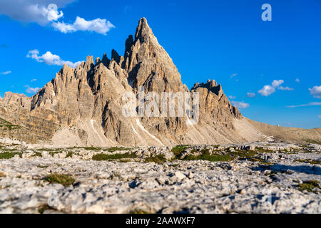 Scenic view of Paternkofel against blue sky during sunny day, Veneto, Italy Stock Photo