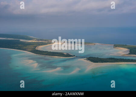 Aerial view of Ouvea, against cloudy sky at Loyalty Islands, New Caledonia