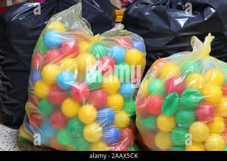 two large bags of balls during the collection of the plastic used in the plastic material recycling Stock Photo