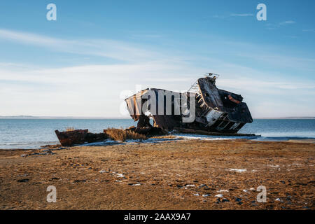 Ship remains on shore of Aral sea or Aral lake, Kazakhstan Stock Photo