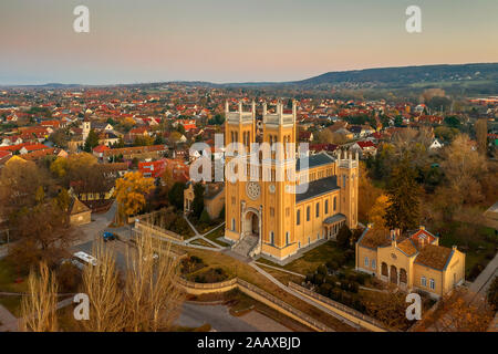 Exterior of the catholic church - designed by Ybl Miklos, is one of the most impressive cathedral in rural Hungary.  Immaculate Virgin statue Stock Photo