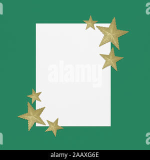 Christmas notepaper frame with gold star border on a green background, and space for copy Stock Photo