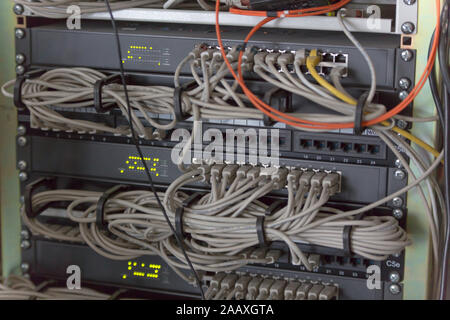 Rack Mounted Servers In A Server Room, close up Stock Photo