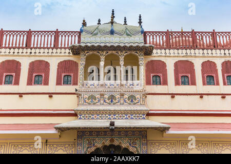 Decorated facade of the Peacock Gate at the city palace in Jaipur, India Stock Photo