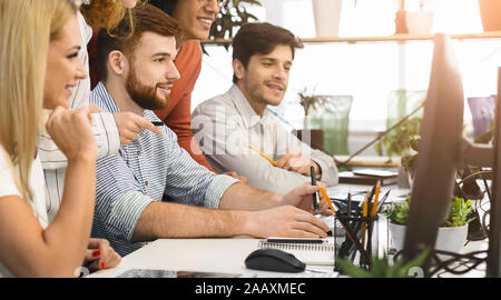 System administrator upgrading software system for office computers Stock Photo
