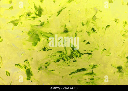 Bright abstract texture of paint on canvas, green and yellow color and its shades. Stock Photo