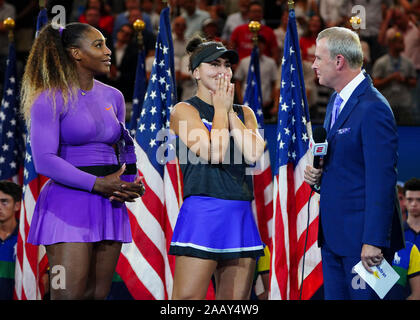 Bianca Andreescu smiling while being interviewed during the trophy presentation ceremony after defeating Serena Williams in women's singles at 2019 US Stock Photo