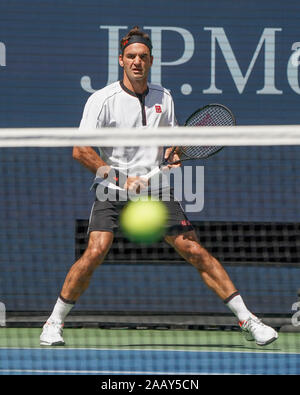 Swiss tennis player Roger Federer waiting for ball during 2019 US Open tennis tournament, New York City, New York State, USA Stock Photo