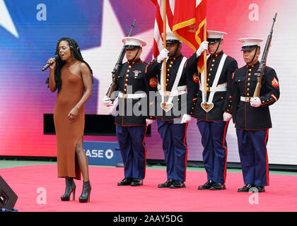 Adrienne Warren singing National Anthem during the 2019 US Open tennis tournament, New York City, New York State, USA Stock Photo