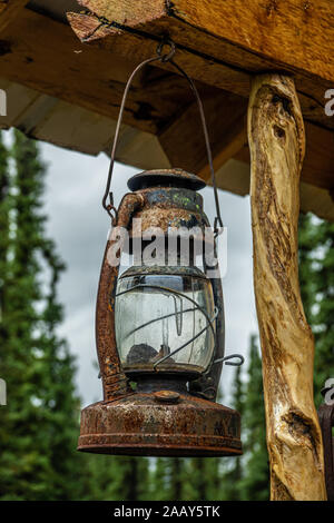Old and rusty kerosene hanging lamp, Alaska Stock Photo