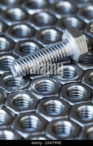 bolt with nuts in stainless steel Stock Photo