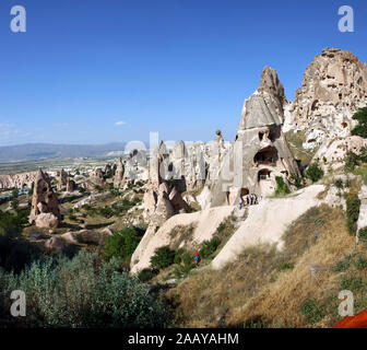 Carved houses in rock in Pigeon Valley, Uchisar, Cappadocia, Turkey Stock Photo