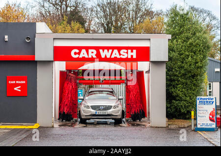 Car going through a car wash in Killarney, Co. Kerry, Ireland. Stock Photo