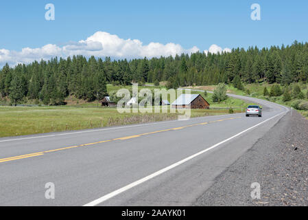 Driving on rural Highway in Grant County, Oregon. Stock Photo