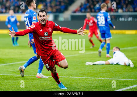 Sinsheim, Germany. 24th Nov, 2019. Soccer: Bundesliga, TSG 1899 Hoffenheim - FSV Mainz 05, 12th matchday, in the PreZero Arena. Levin Öztunali from Mainz cheers his goal to 1:0. Credit: Uwe Anspach/dpa - IMPORTANT NOTE: In accordance with the requirements of the DFL Deutsche Fußball Liga or the DFB Deutscher Fußball-Bund, it is prohibited to use or have used photographs taken in the stadium and/or the match in the form of sequence images and/or video-like photo sequences./dpa/Alamy Live News Stock Photo